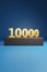 Golden 10000 number in three dimensions Golden number 10000 on a podium. 3d illustration