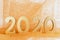 Golden 2020 New Year horizontal template with golden glitter. Minimal Christmas or New Year concept