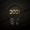 Golden 2021 sign in black wreath