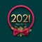 Golden 2021 sign in red wreath