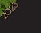 Golden 2023 sign with green fir background with space for text