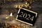 golden 2024 written on little board on rustic wooden