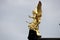 Golden angel sculpture decorating the facade of the Albertinum, Dresden, Germany