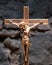 Golden antique crucifix on dark background