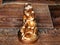 Golden antique statuette after restoration