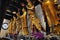 Golden Arhats statues from the Jade Buddha Temple interior in Shanghai