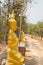 Golden asian angel statue beside the walkway