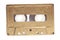 Golden audio cassette tape isolated on white background