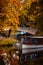 Golden autumn canal with a boat in the centre of Riga, Latvia