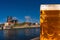 Golden Autumn and golden beer in front of cathedral in Magdeburg, Germany