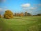 Golden autumn landscape; yellow foliage, fileds and meadows