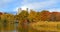 Golden autumn in New York City Central Park. Turtle Pond, originally known as Belvedere Lake, abuts Belvedere Castle, and contains