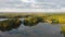 Golden autumn of Poland by the lake from above.