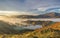 Golden Autumn sunrise in a valley of the Lake District