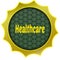 Golden badge with HEALTHCARE text.