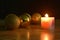 Golden ball couple candle light  for decoration in Christmas and new year festival in black background
