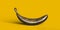 Golden banana  on a yellow background background