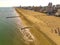 Golden beach of Jesolo  with bay and umbrellas from above