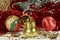 Golden bell, stars, baubles and other Christmas decorations