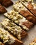 Golden Biscotti or Cantuccini on the baking pan. Traditional Sweet Italian cookies that are making with two times baking