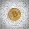 Golden Bitcoin on black and white binary 1 and 0 background