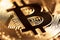 Golden bitcoin close-up
