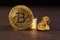 Golden Bitcoin Coin and mound of gold. Bitcoin cryptocurrency. Business concept