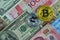 Golden bitcoin on international banknote, bitcoin electronic mon