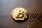 a golden bitcoin with the letter b on it generated by ai