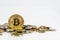 Golden bitcoin over many international money coins isolated on white background.  Crypto currency concept.  Bitcoin cryptocurrency