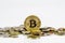 Golden bitcoin over many international money coins isolated on white background.  Crypto currency concept.  Bitcoin cryptocurrency