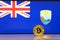 Golden bitcoin stands on a background of state flag of Saint Elena