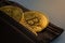 Golden Bitcoin token on a wallet.