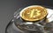 Golden bitcoin on the top of cryptocurrencies stack kept in a jar in blurry close-up shot. Cryptocurrency investment concept. 3D r