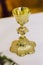 Golden blessed chalice for the Christian liturgy