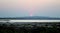 Golden and bluish sunset in the lake of the saltworks of Torrevieja