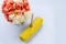 Golden boiled sweet corn on the white ground with colorful flower