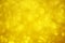 Golden Bokeh shape round Background with Bright gold glitter Lights. Studio shot
