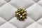 Golden bow on white tufting fabric cloth material