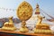 Golden brahma symbol in front of Bodhnath stupa