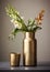 Golden brass vase, designed in a modern cylindrical shape. Add a glittering touch to your tabletop decor.