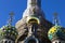 Golden bright domes on an Orthodox Church under construction