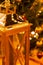 Golden bright lantern Christmas vertical design close-up on the background festive fir