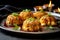 golden brown crab cakes cooling on plate