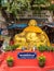 Golden Buddha down from Wat Koh Loy shrines on Ko Loi Island, Si Racha, Thailand