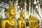 Golden Buddha and  glitter glass column at Wat Tha Sung, Uthai