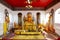 Golden buddha image statue of Phra That Choeng Chum temple