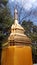 Golden Buddha sculpture and pagoda