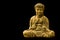 Golden Buddha sits in lotus position