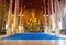 Golden buddha statue in church